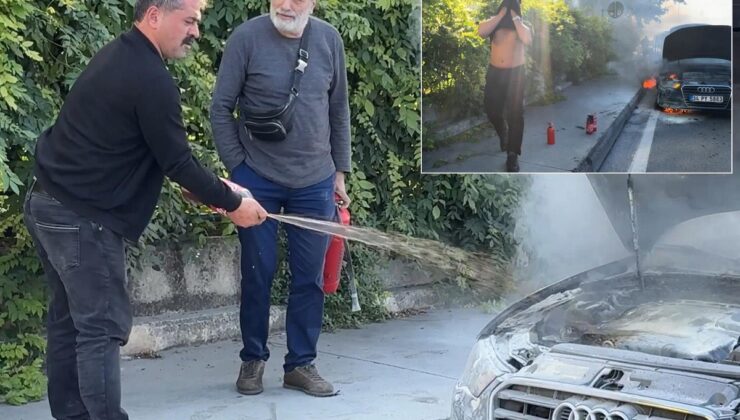 Yanan aracı kola ile söndürmeye çalıştı